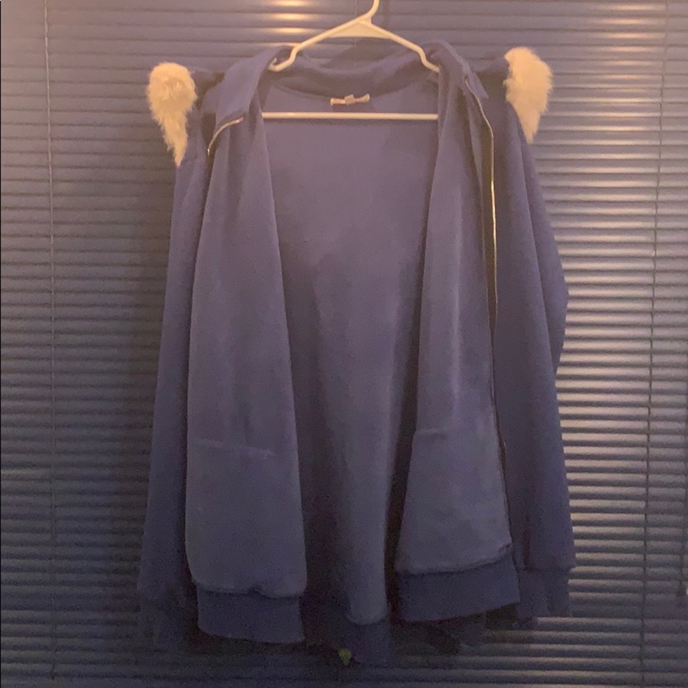 Large blue coat with white fur